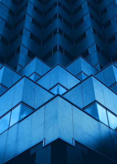 blue and white glass walled building